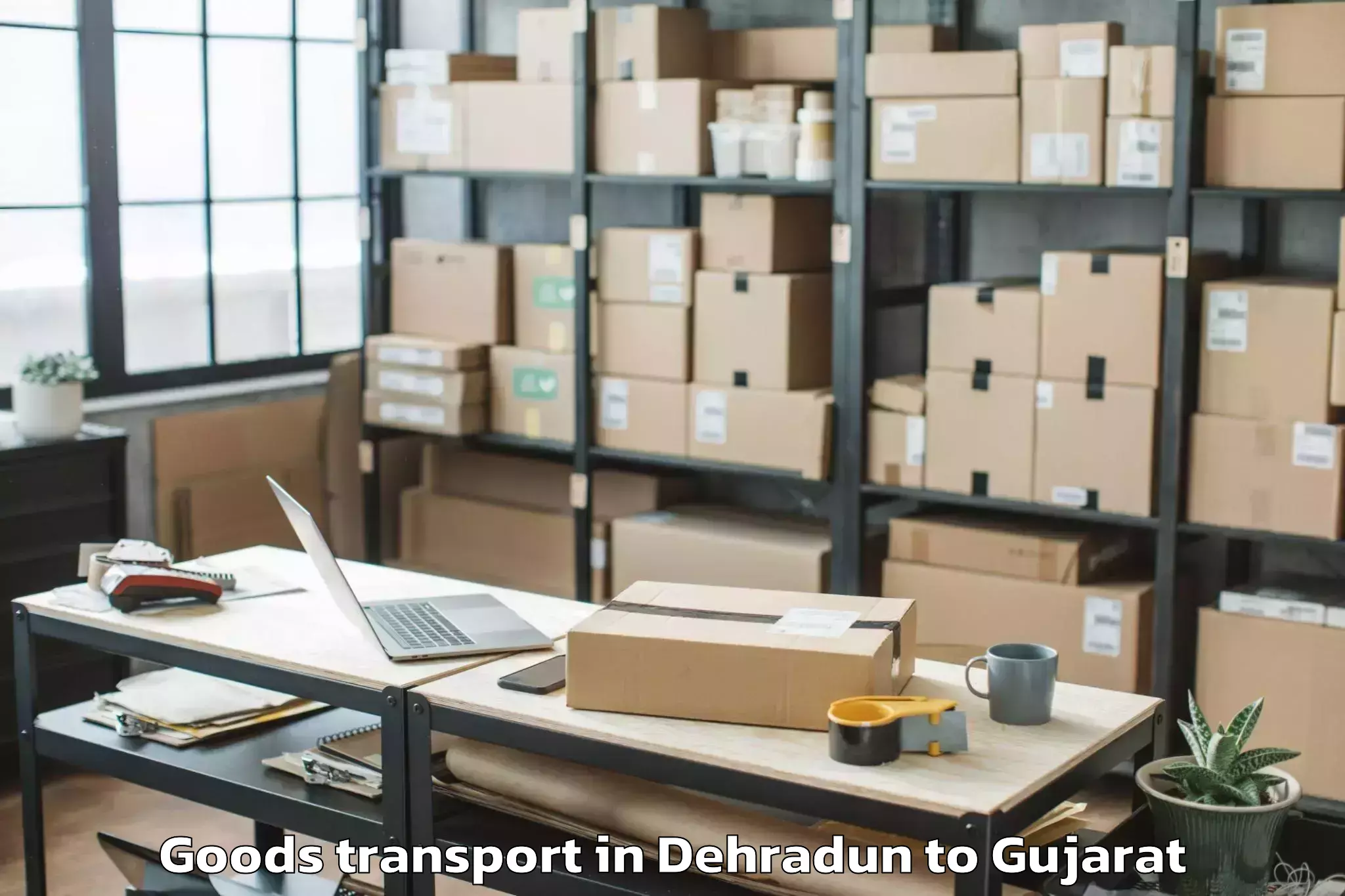 Trusted Dehradun to Karjan Goods Transport